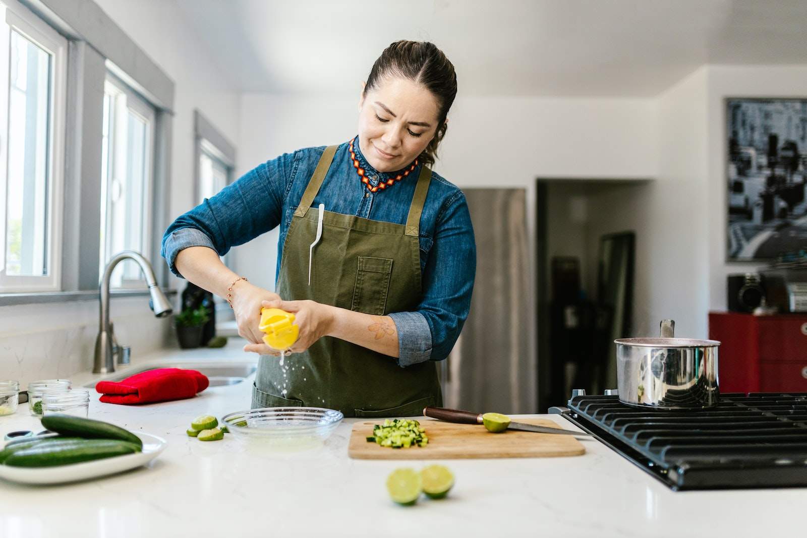 Woman Preparing Food in Kitchen